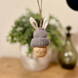 Wooden Rabbit with Knitted Grey Hat