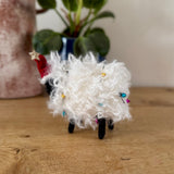 Woolly Sheep Stuck in Fairy Lights