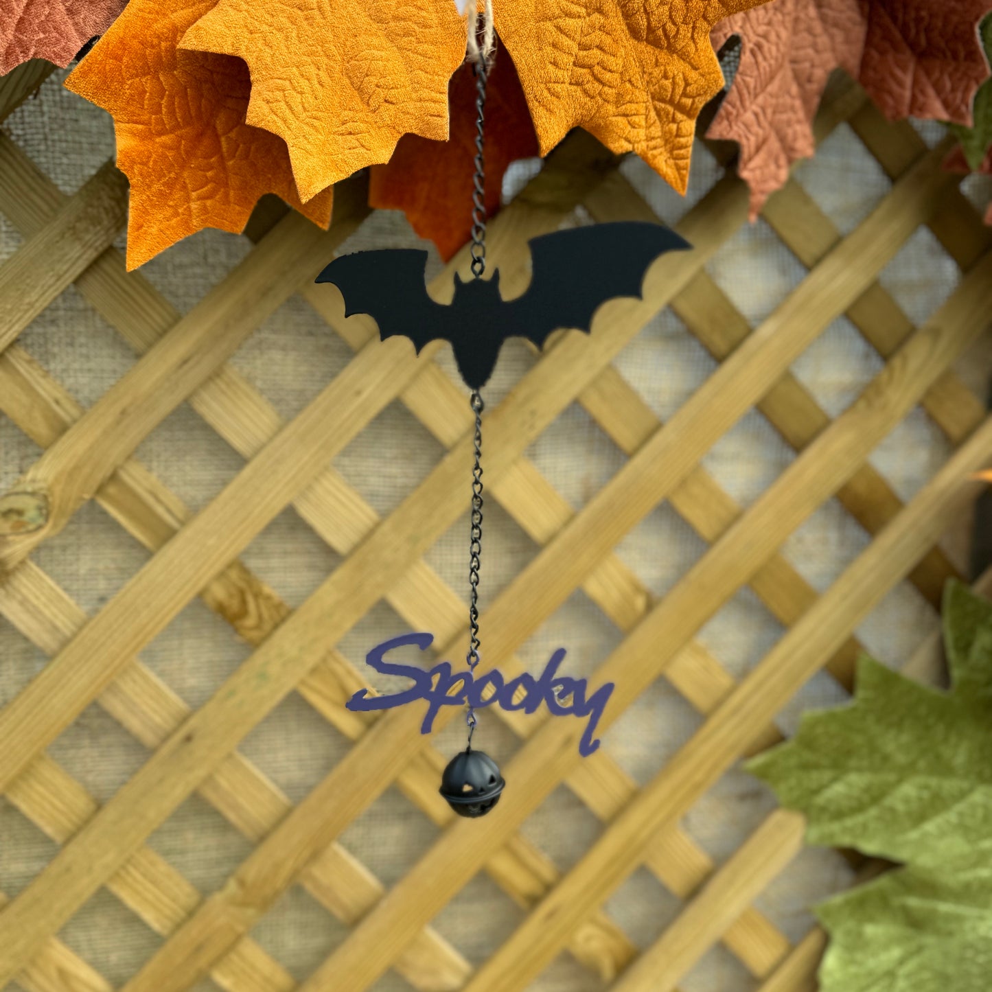 Spooky Black Metal Bat Hanger With Pumpkin