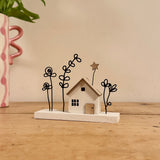 Wooden House with Wire Flowers