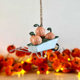 Hanging Wheelbarrow of Pumpkins