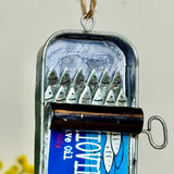 Hanging Anchovies in Blue Tin