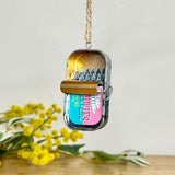 Hanging Anchovies in Pink Tin