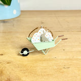 Hanging Bunny in Wheelbarrow