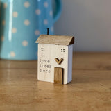 Love Lives Here Wooden House