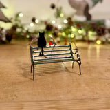 Black Cat on Park Bench