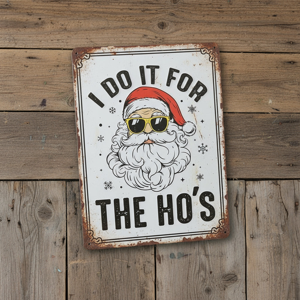 Metal sign with a stylized Santa Claus wearing sunglasses and text 'I DO IT FOR THE HO'S' on a white background.