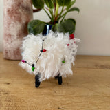 Woolly Sheep Stuck in Fairy Lights