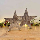 Pair of Tarnished Silver Leaf Wooden Stars