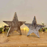 Pair of Tarnished Silver Leaf Wooden Stars