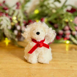 Fluffy White Dog with Red Bow