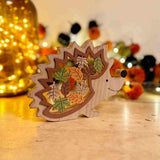 Wooden Hedgehog with Leaves