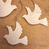 Trio of White Metal Doves