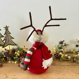 Sitting Reindeer In Stripy Jumper